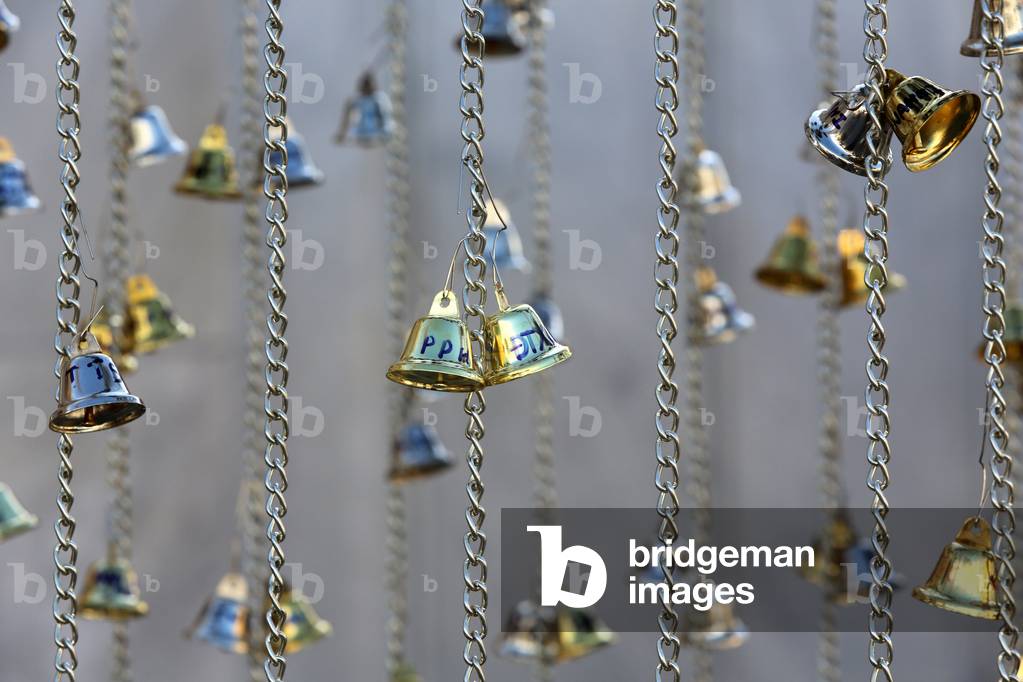 Wat Trahimit, Bangkok. Bells offered by the faithful. Thailand