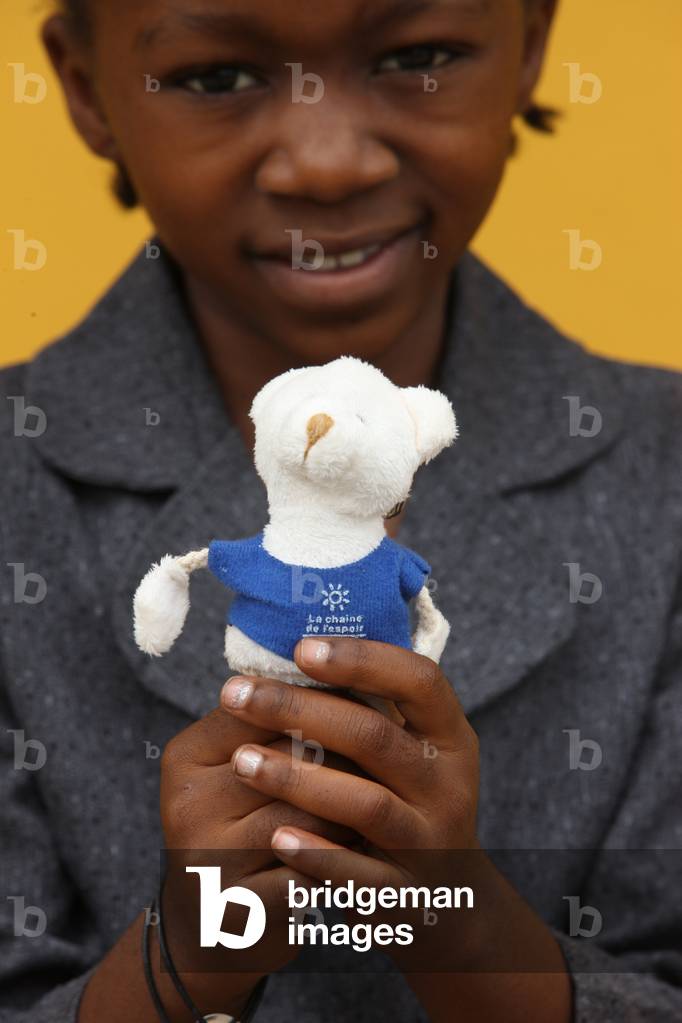 African girl with a toy Brazzaville Congo