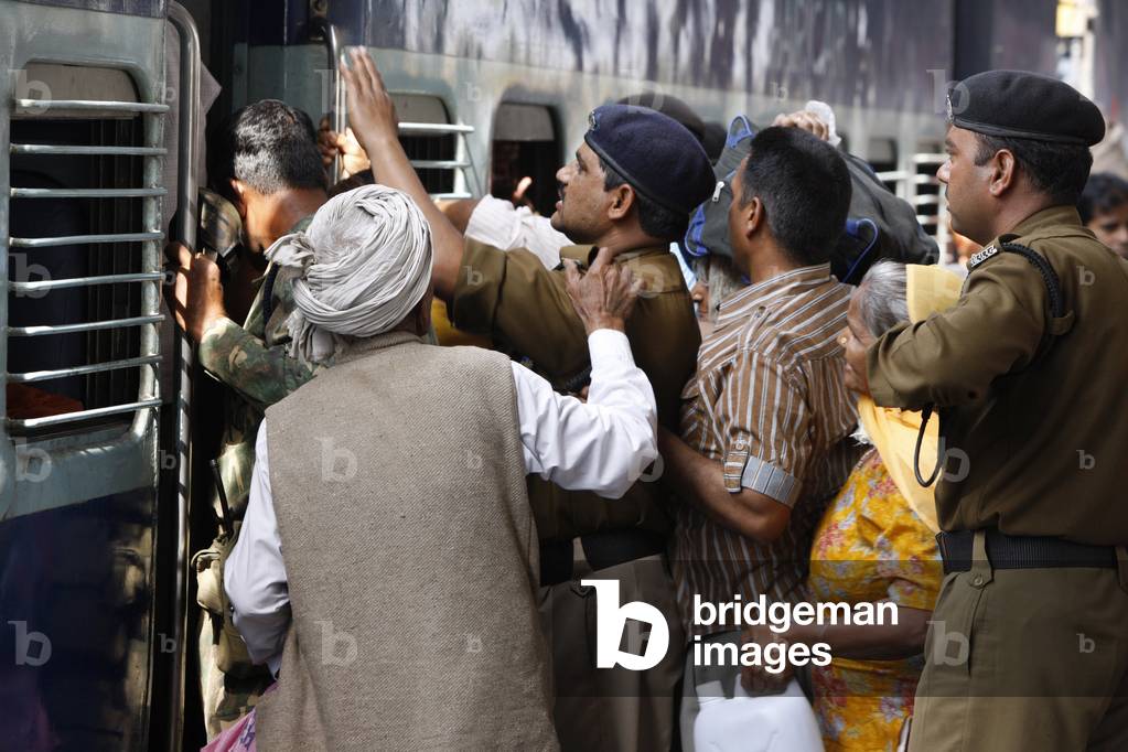Pilgrims boarding a train in Hardwar station, Haridwar, India