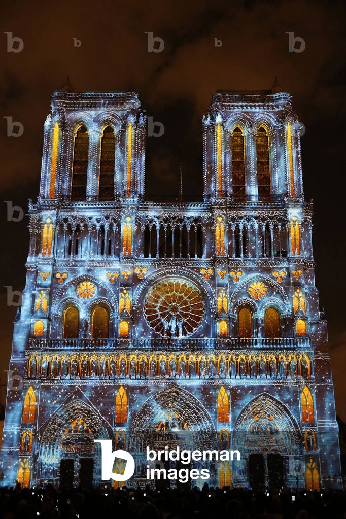 Sound and light show at Notre Dame de Paris cathedral, France (photo)