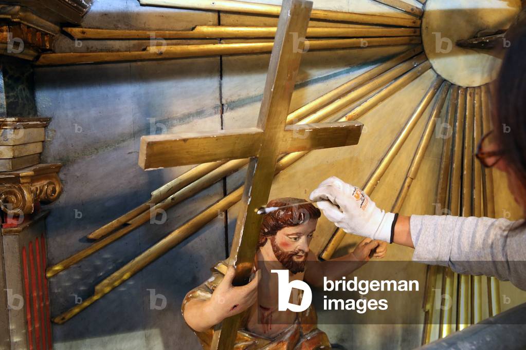 Restoration of Saint Gervais baroque church. Repair of the altarpiece statues. Jesus. France