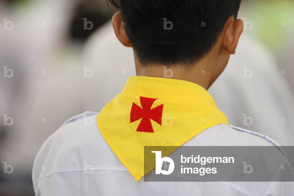 Scout movement, Young boy, Hoi An Cathedral, Vietnam, 2019 (photo)