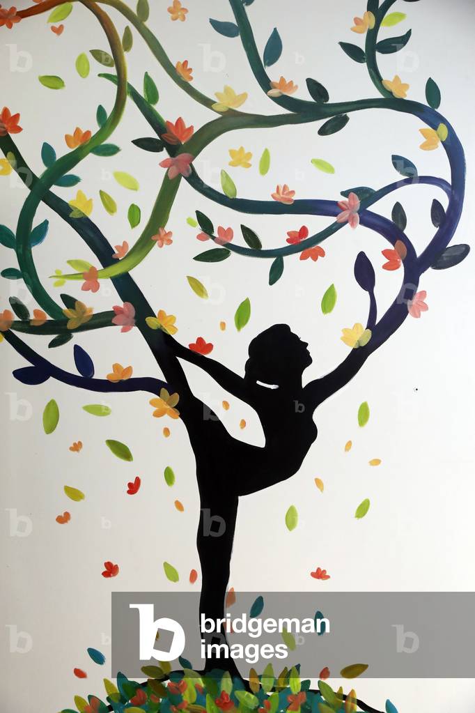 Yoga painting on a wall, Ho Chi Minh City, Vietnam (photo)