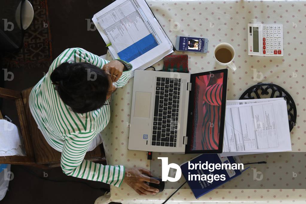Woman working from home in Montrouge, France
