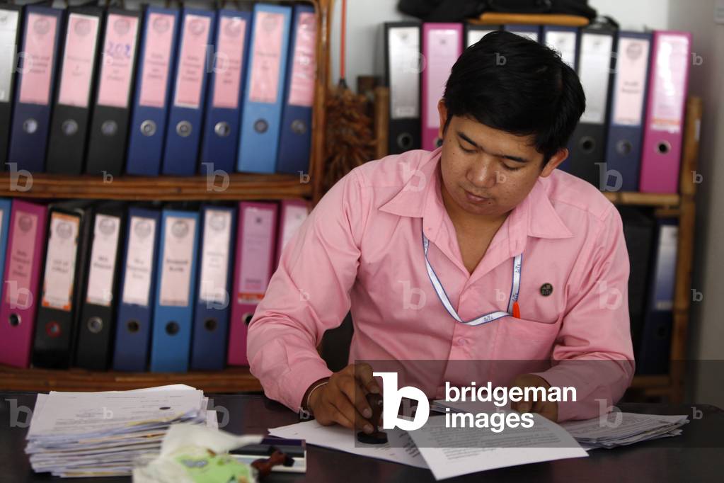 Chamroeun microfinance employee working in the Pochentong branch office Pochentong Cambodge