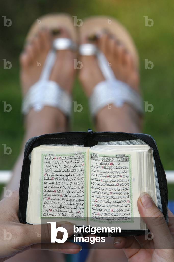 Woman reading Koran, Le Souillard, France