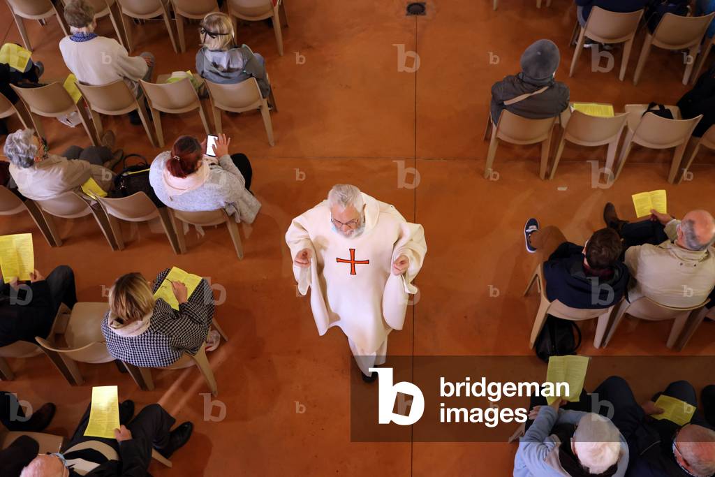 Catholic church during covid-19 epidemic.  Celebration of the mass.   Sanctuary of La Benite Fontaine. France.