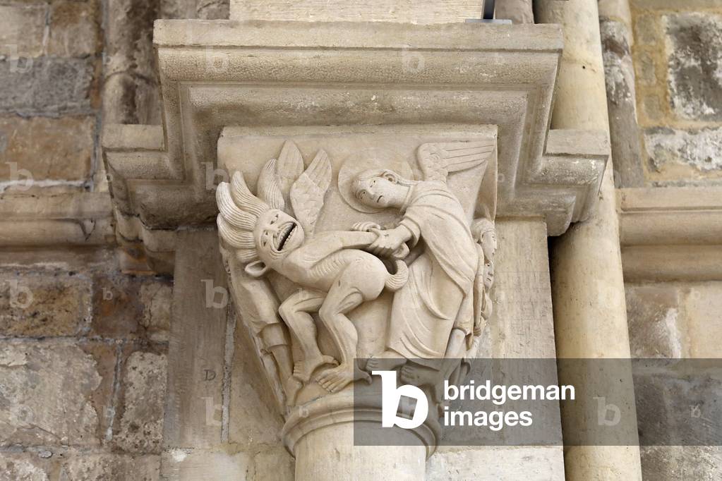 Saint Mary Magdalene basilica, Vezelay, France. Capital depicting Angel Raphael vanquishing Asmodeus
