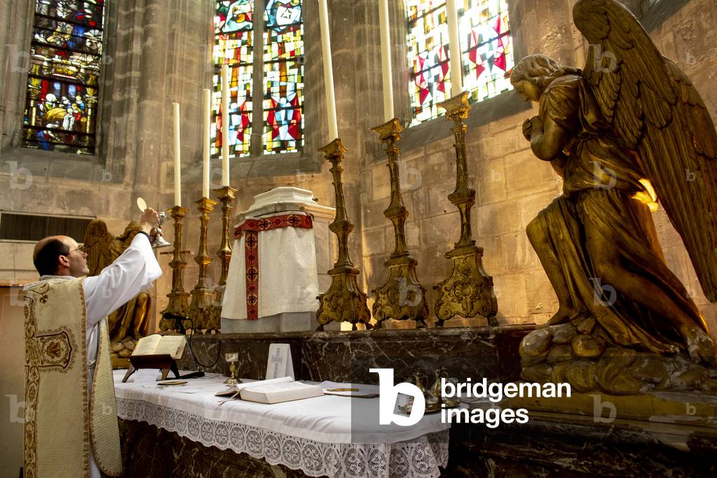 Mass in St Nicolas's church, Beaumont le Roger, France during 2019 lockdown.
