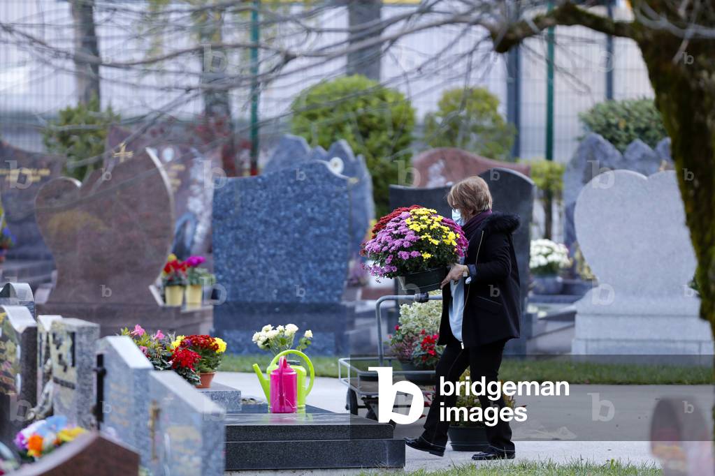 All Saints Day in a cemetery. France.