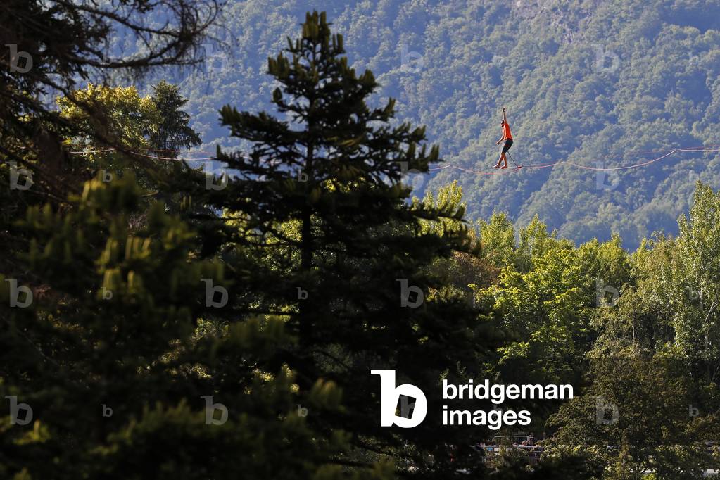 French Slackliner Nathan Paulin walking on a highline at saint Gervais les Bains in the french Alps, Saint Gervais, France, 2020 (photo)