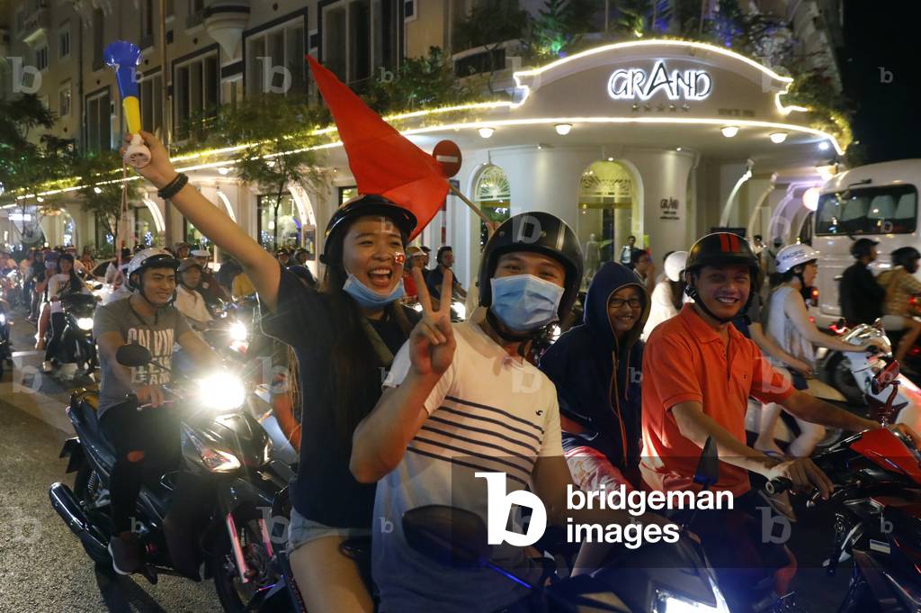 Vietnamese people on Motorbikes, Road traffic, Ho Chi Minh city, Vietnam (photo)