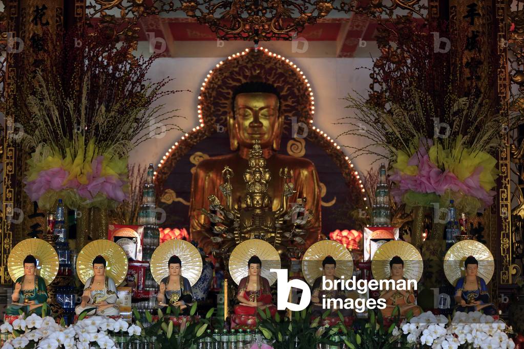 Chua Vinh Nghiem buddhist pagoda. Altar with Buddha statues. Ho Chi Minh City. Vietnam