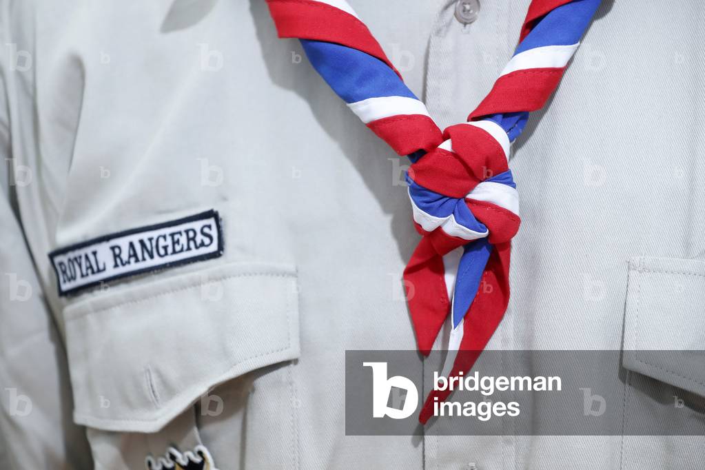 Boy wearing scout scarf, Close-up, Strasbourg, France.