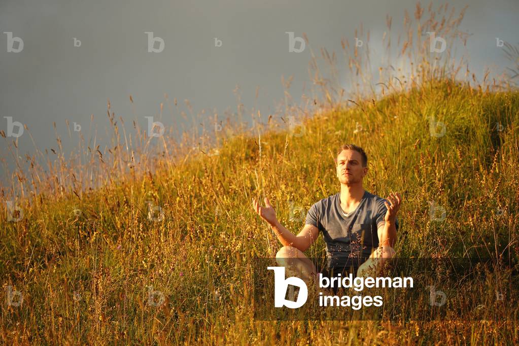 Man praying outside, , Saint-Gervais-les-Bains, France