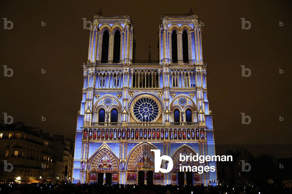 Sound and light show at Notre Dame de Paris cathedral, France (photo)