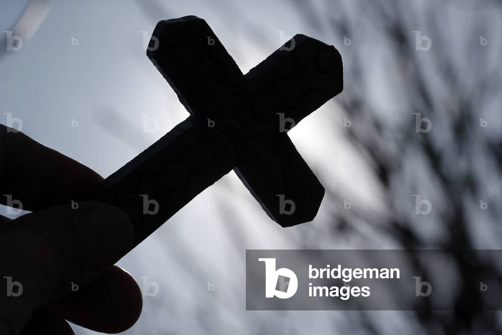 Silhouette of christian cross against the sky, Close-up (photo)