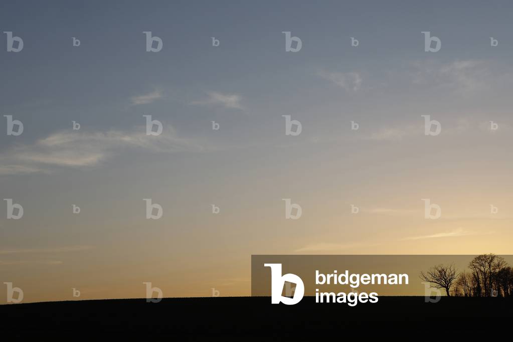 Sunset sky in Le Mesnil en Ouche, France.