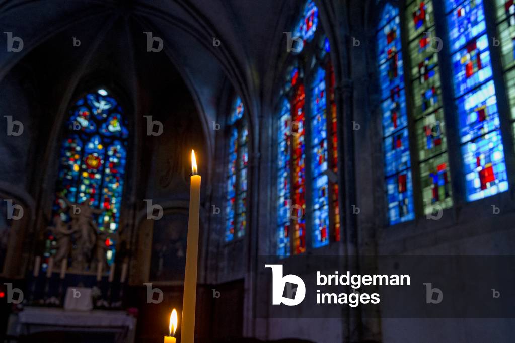 St Nicolas's church, Blois, France, Candle in chapel. (photo)