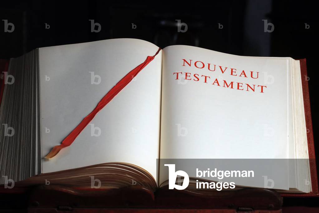 Open bible.  New testament.  France.  France.