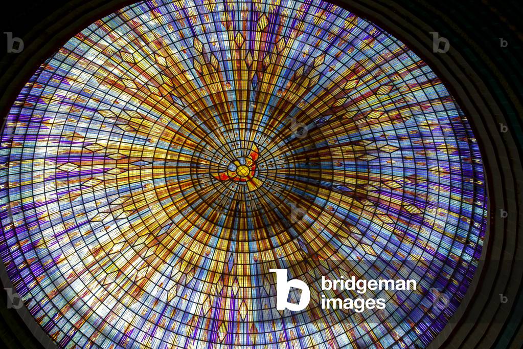 Basilica of Our Lady of Peace, a Roman catholic minor basilica in Yamoussoukro, the administrative capital of Cote d'Ivoire (Ivory Coast). Rose window with a dove symbol. (photo)