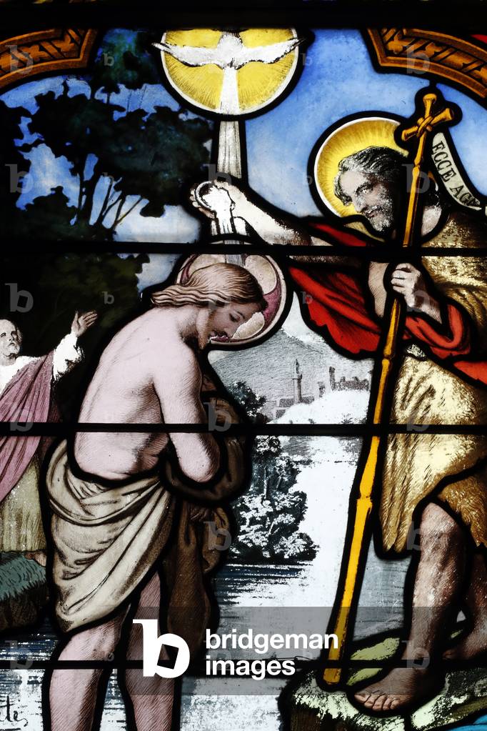 Stained glass window.  The baptism of Jesus by John the Baptist.  Groisy. France.