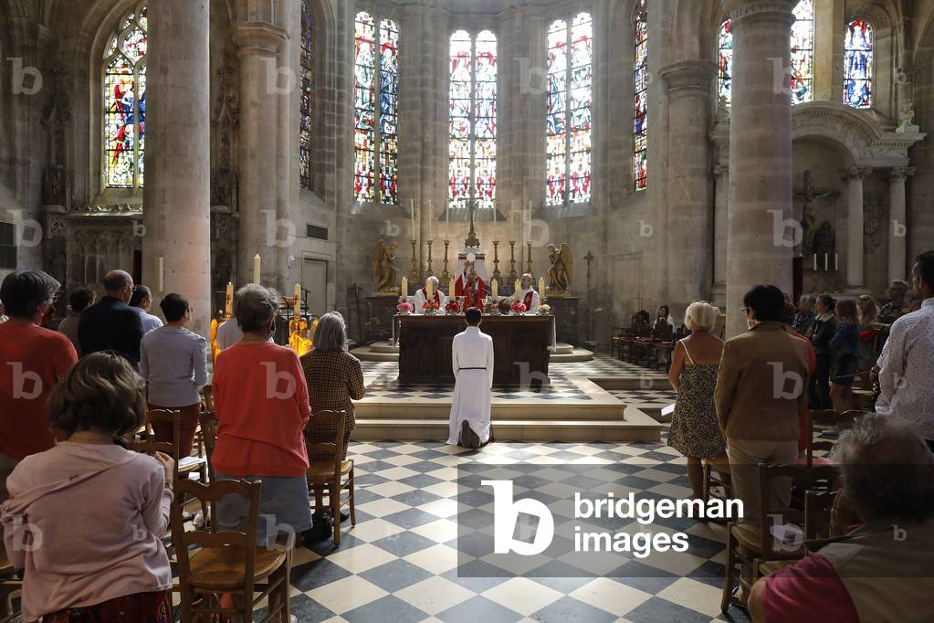 Pentecost mass in St Nicolas's church, Beaumont-le-Roger, France