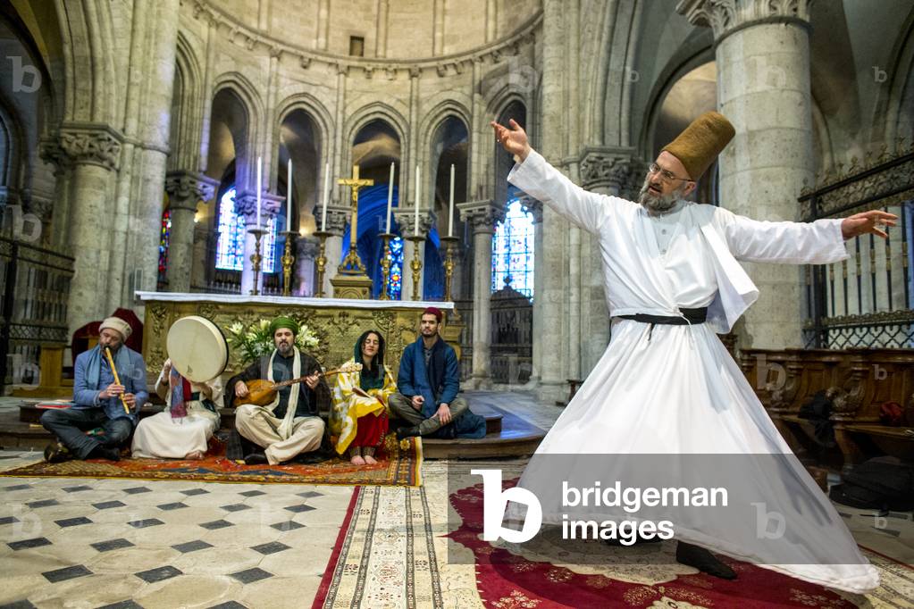 Sufi muslim wedding in St Nicolas's catholic church, Blois, France, Sufi music band and whirling dervish. (photo)