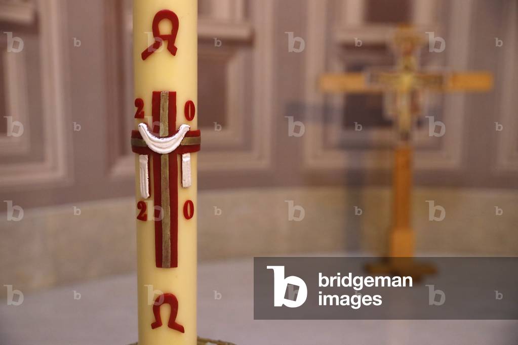 Catholic church. Paschal candle. A new Paschal candle is blessed and lit every year at Easter. France.