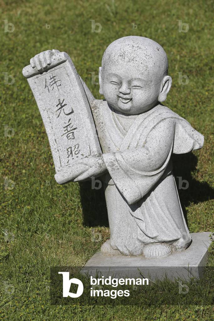 Geneva, Geneva, Switzerland, le 19/6/2015 - Fo Guang Shan temple. Novice monk statue.