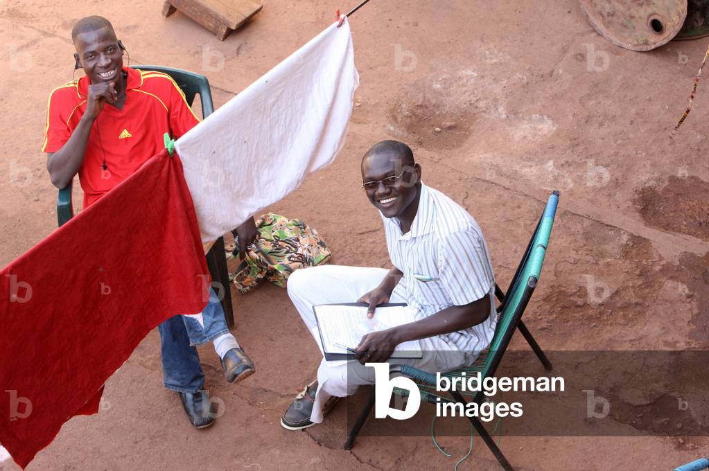 Two african men sitting & smiling Bamako Mali
