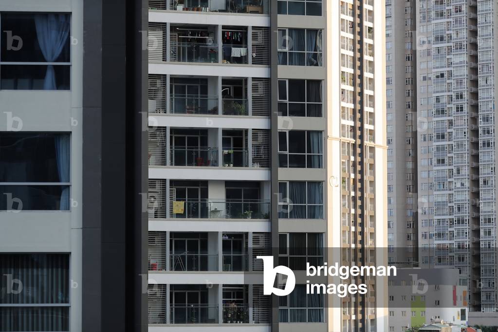 Apartment building windows, Ho Chi Minh City, Vietnam, 2019 (photo)
