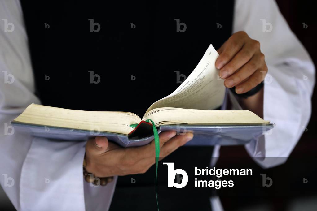 Cistercian Abbey, Our Lady of My Ca, Monk reading the bible, Vietnam, 2019 (photo)