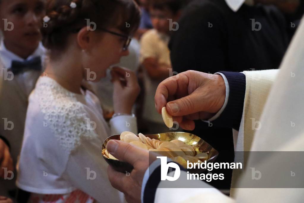 Catholic mass, First communion, Passy, France, 2019 (photo)