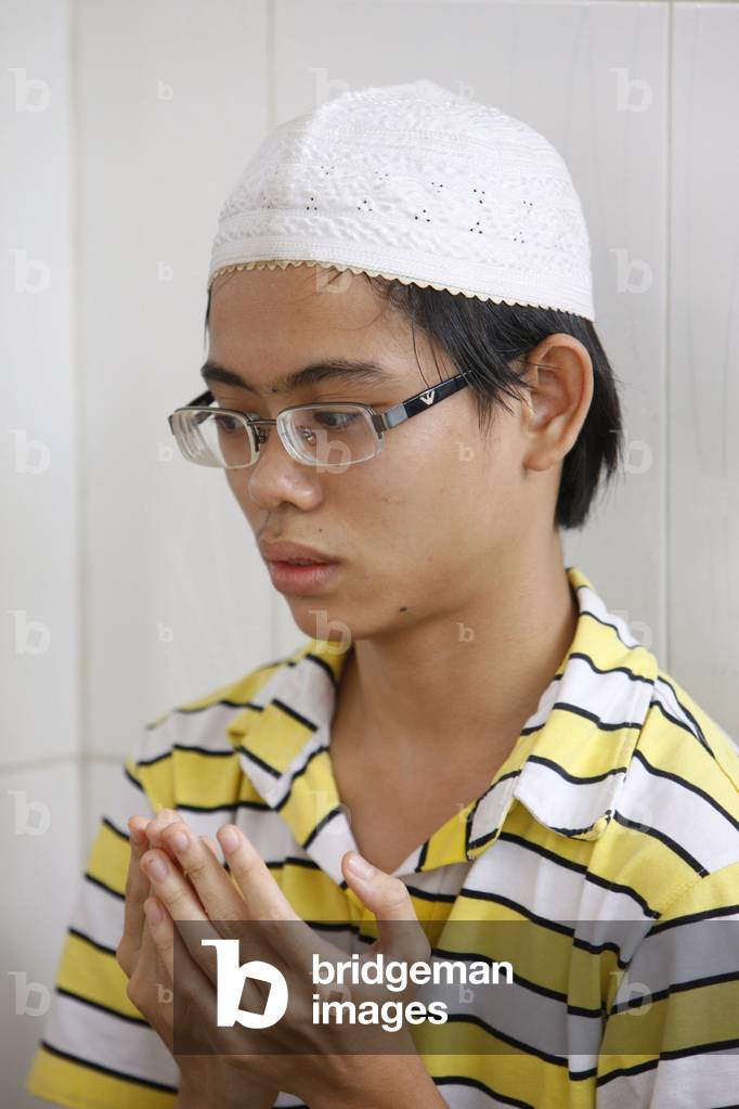 Salat is the obligatory Muslim prayers, performed five times each day by MuslimsIt is the second Pillar of Islam, Ho Chi Minh City, Vietnam