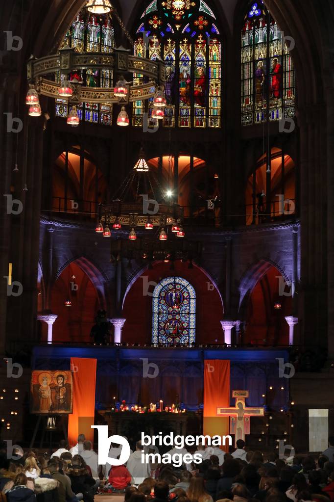 Basel Cathedral Minster, European Youth meeting of Taize in Basel, Pilgrims at midday prayer with brother Alois the prior of the Taize community, Switzerland (photo)