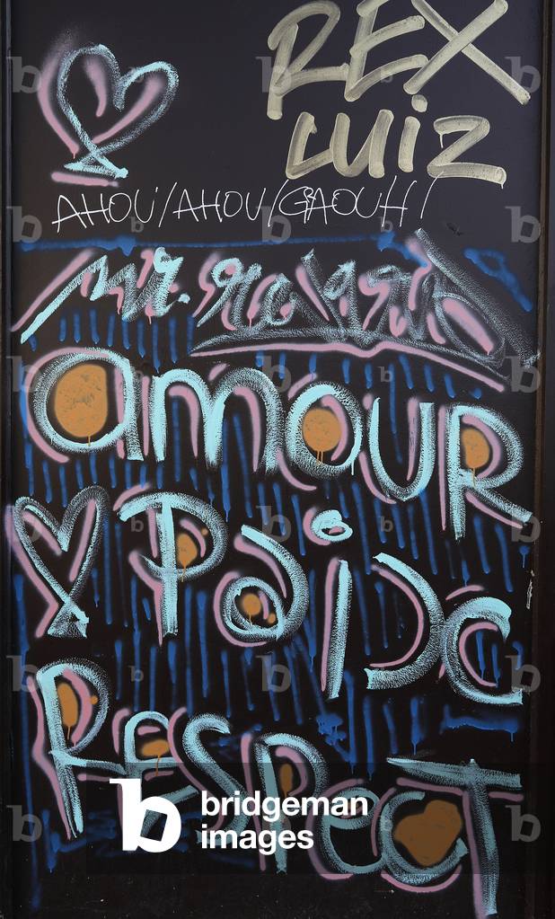 Wall painting in Paris, France : Love, Peace and Respect