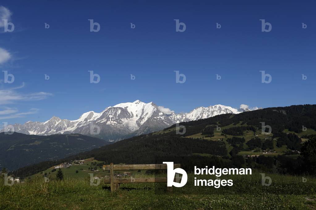 Wooden bench facing Mont Blanc massif. French Alps.   France.
