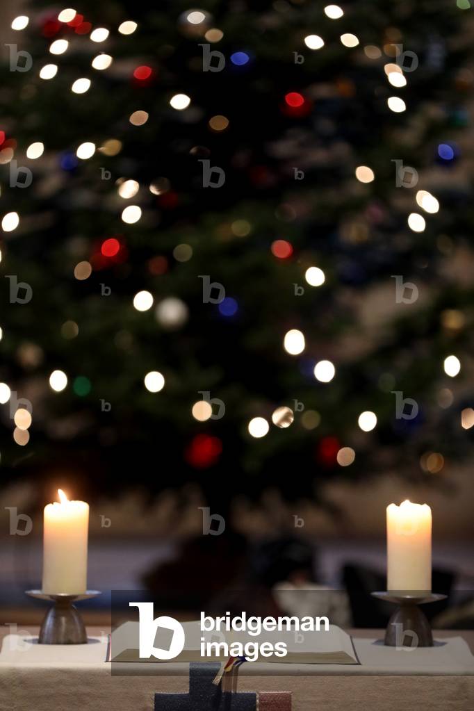 Theodorskirche, Christmaas tree, bible and church candles, Basel, Switzerland (photo)
