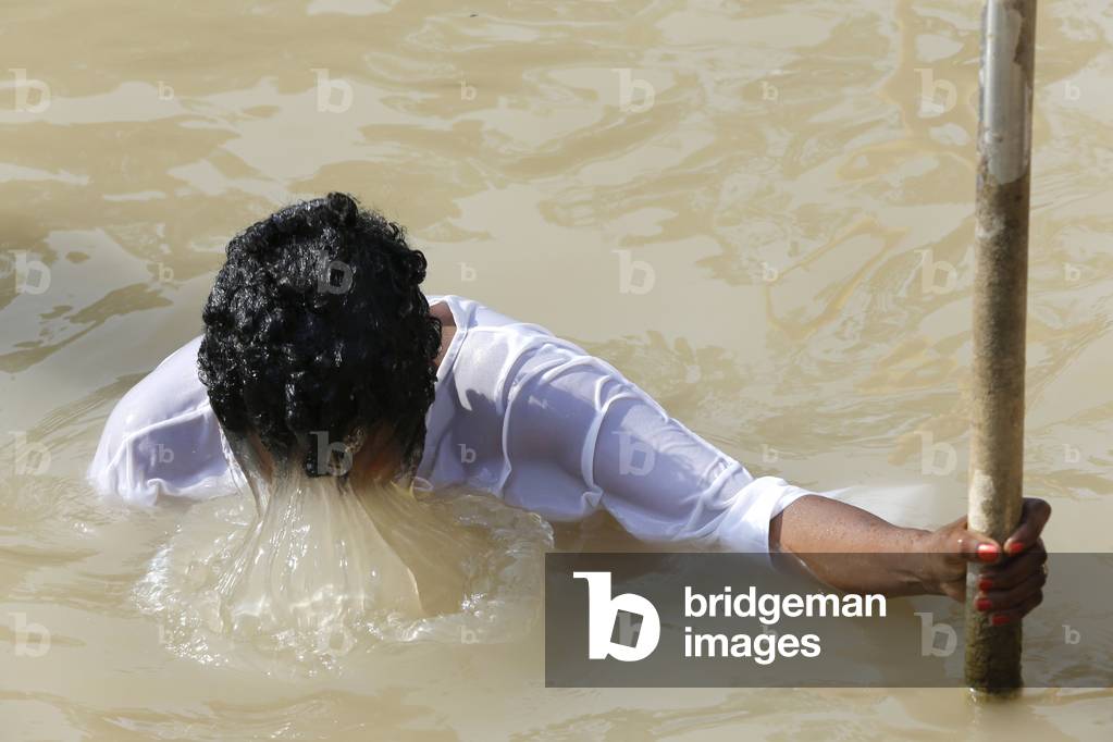 Baptism in Jordan River, Qasr el Yahud , Israel