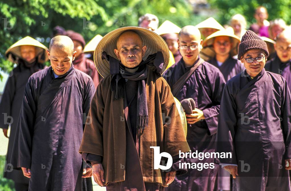 Thich Nhat Hanh leading a walking meditation in Plum Village buddhist community, 2022 (photo)