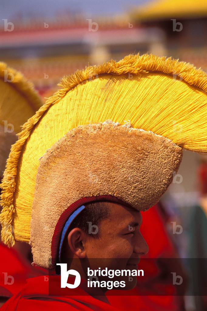 Tibetan monk celebrating Lo Sar New Year Festival, Bodh Nath, Nepal