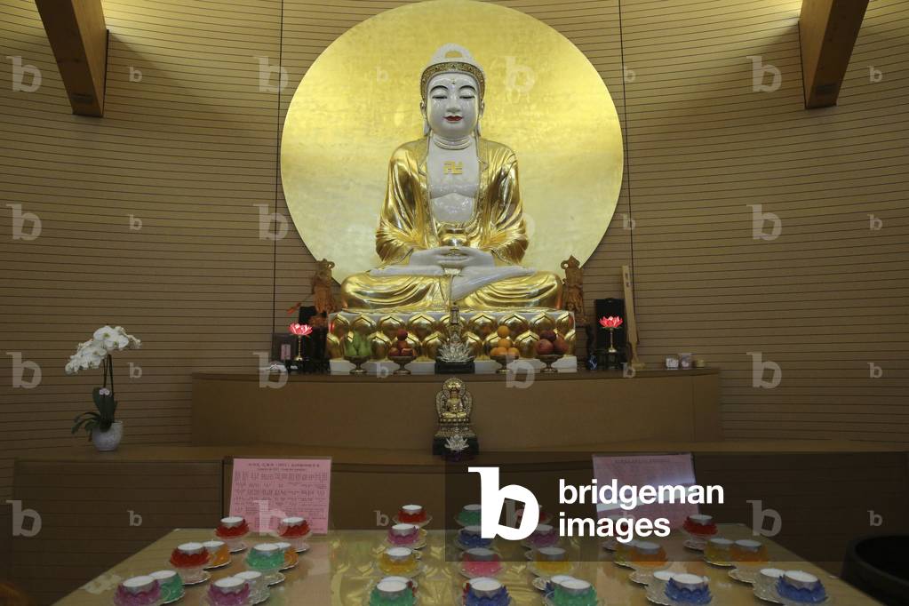 Geneva, Geneva, Switzerland, le 19/6/2015 - Fo Guang Shan temple. Buddha hall. Main altar. Buddha statue.
