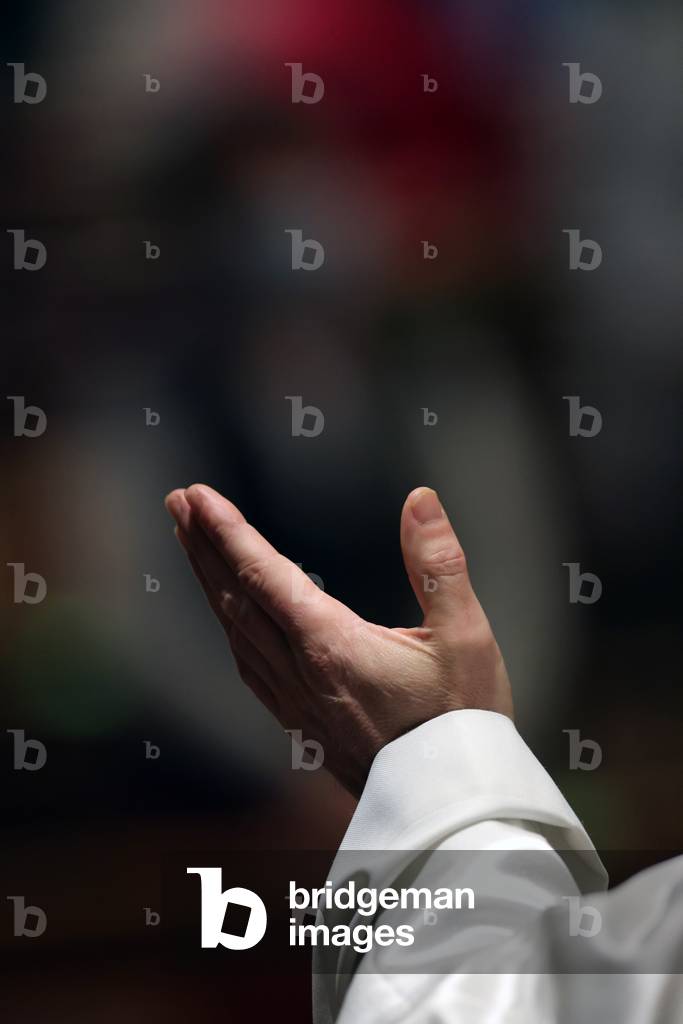 Catholic church during covid-19 epidemic. Sunday mass.  Priest at eucharistic celebration.  Sallanches.  France.