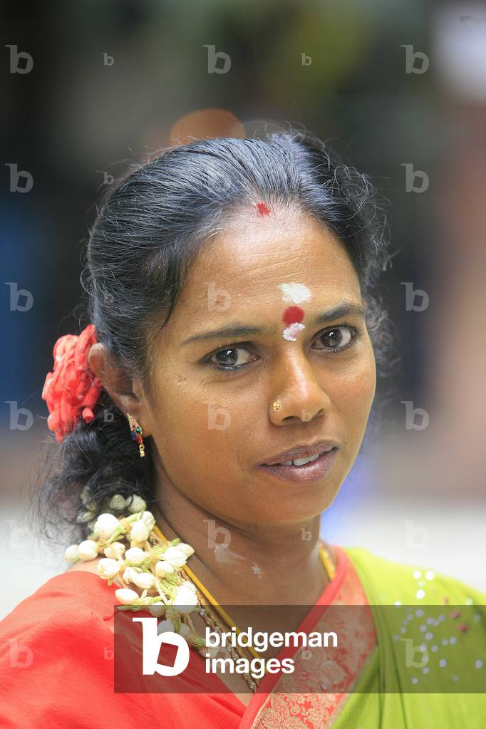 Sri Maha Mariamman temple. Woman, Kuala Lumpur, Malaysia