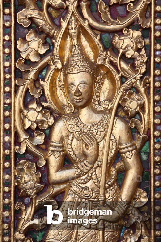 Buddhist deity at Wat Sene temple Luang Prabang Laos