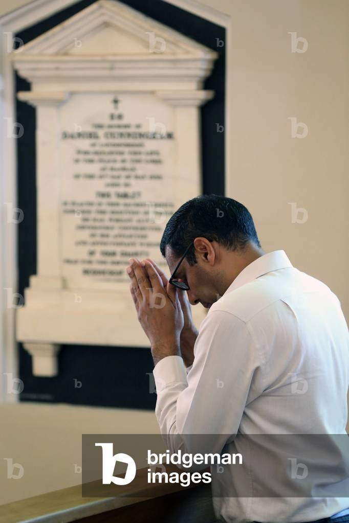 Cathedral of the Good Shepherd. Man Praying. Singapore