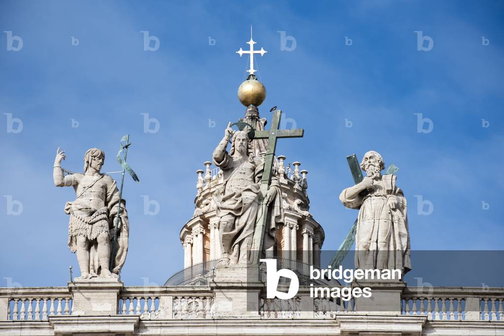 Statue of Jesus on top of Saint Peter's Basilica facade, Vatican city, 2018 (photo)