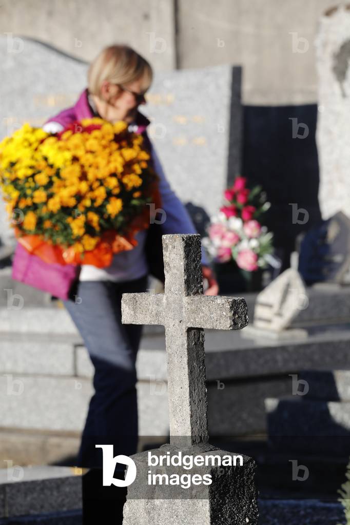 All Saints Day in a cemetery. France.