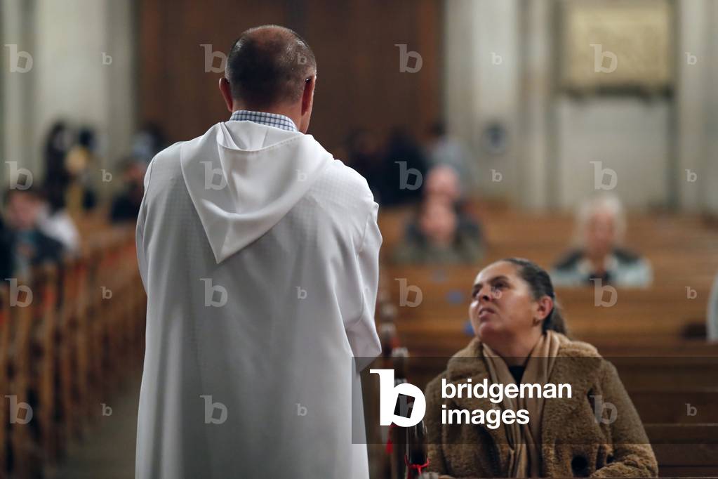 Basilica of Our Lady of Geneva.  Priest.